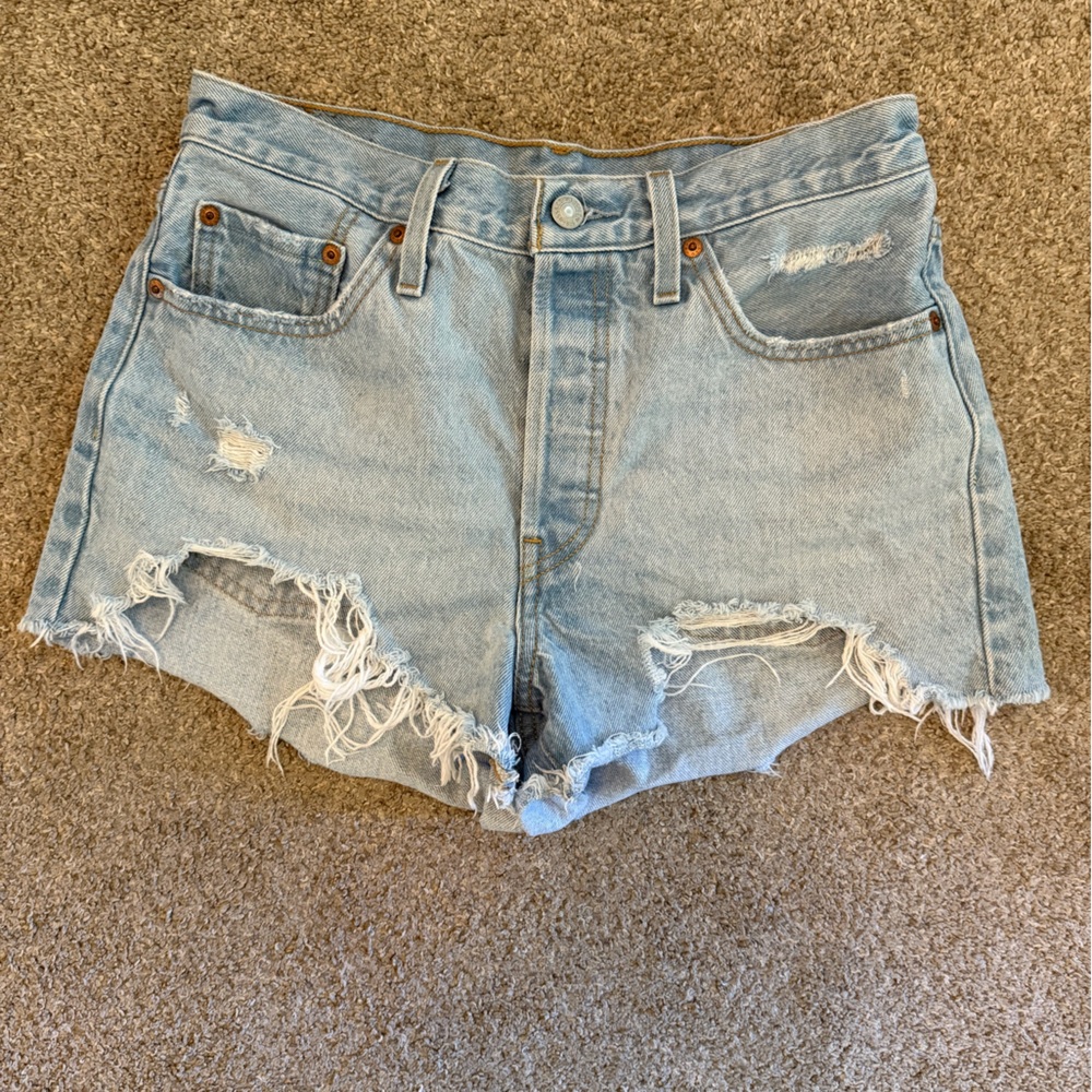 Levi’s 501 Distressed Light Blue Denim Shorts